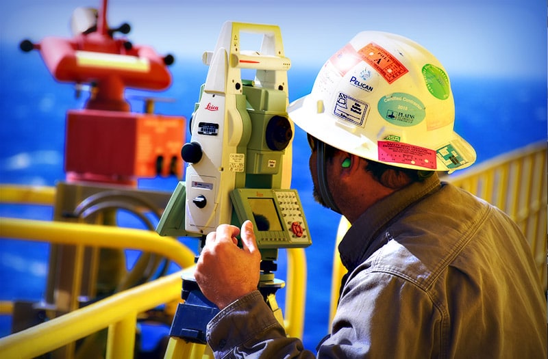 Man-surveying-on-rig